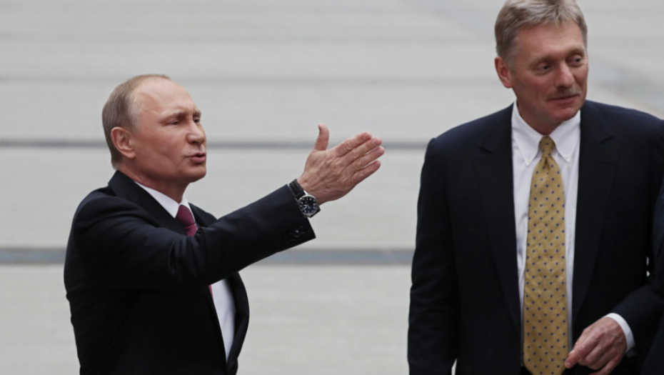 Vladimir Putin i Dmitri Peskov