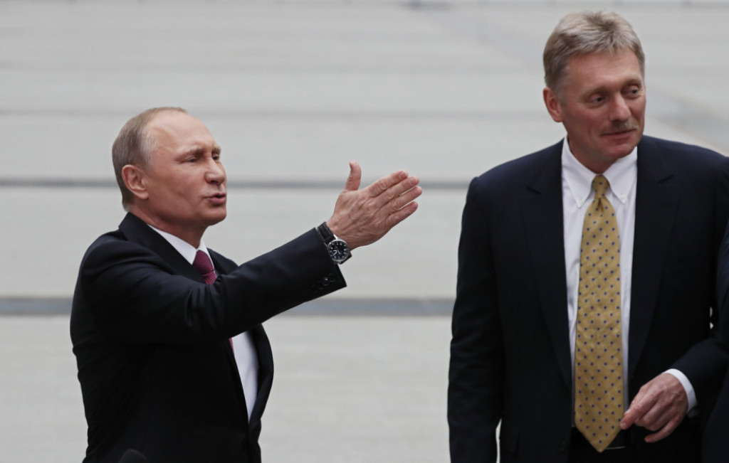Vladimir Putin i Dmitri Peskov